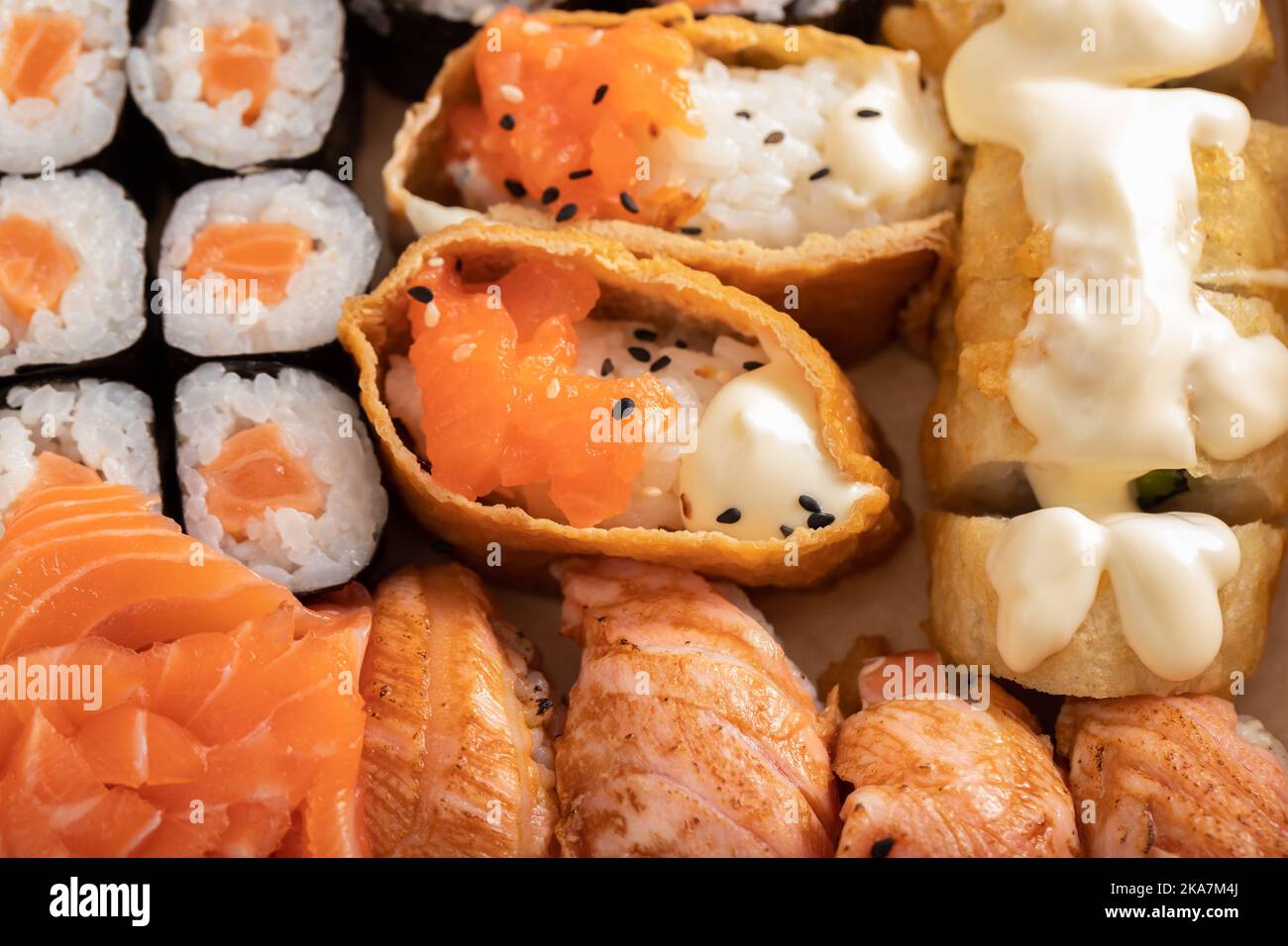 Assorted sushi nigiri and maki set. A variety of Japanese sushi with tuna, crab, salmon and