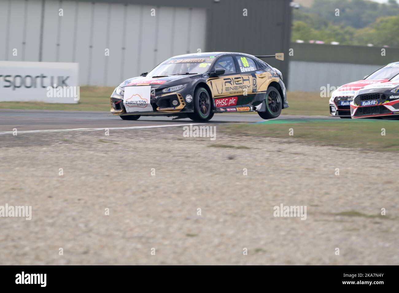 Jade Edwards number 99 driving in the Rich Energy BTC racing Honda