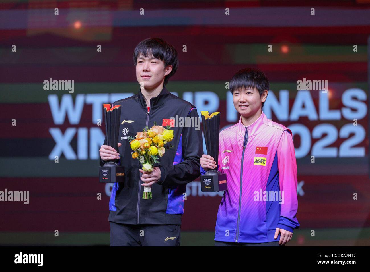 On the award ceremony, Chinese table tennis player Wang Chuqin wins