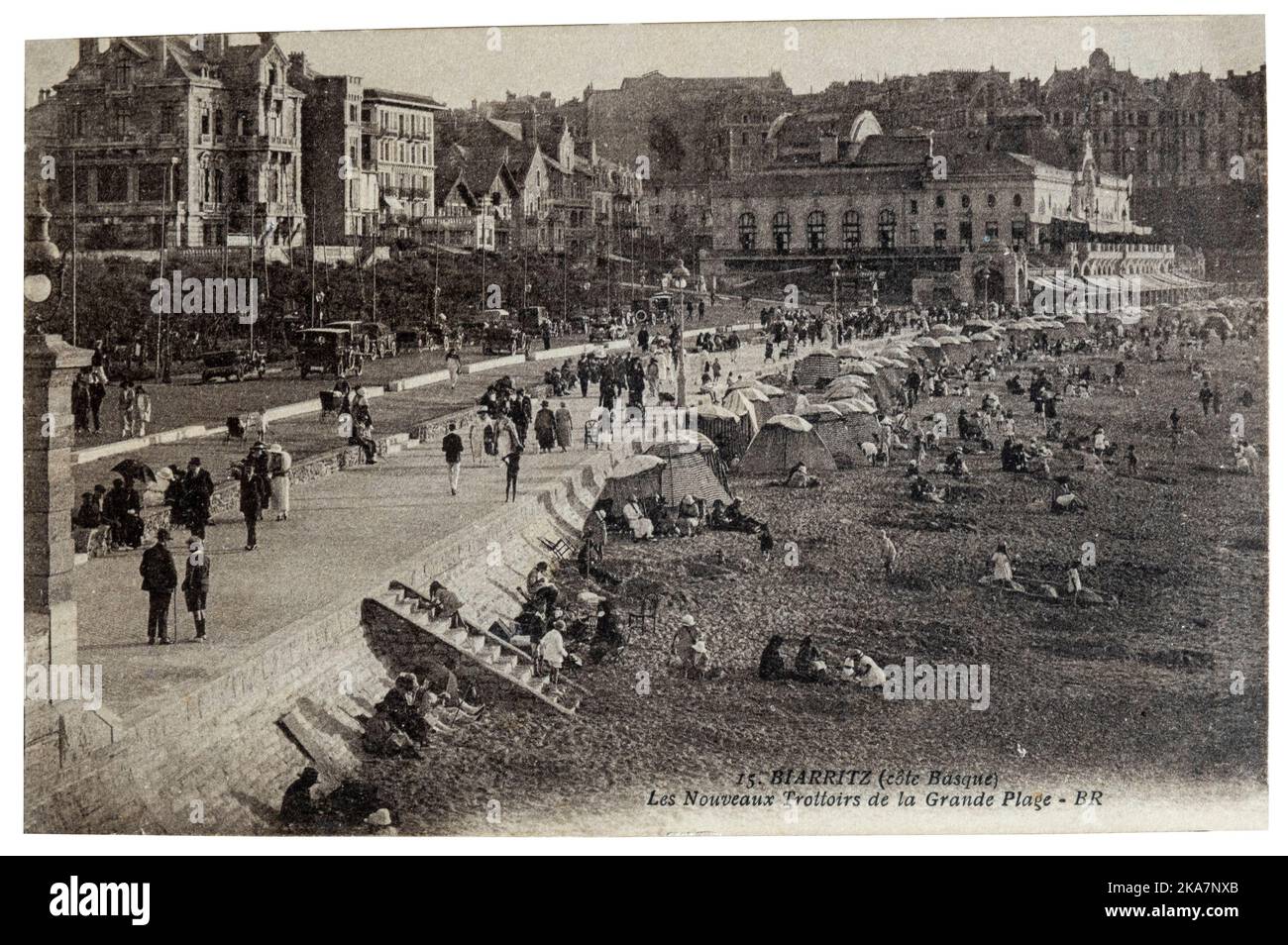 Biarritz, France - circa 1921: postcard new sidewalks of grande plage Stock Photo