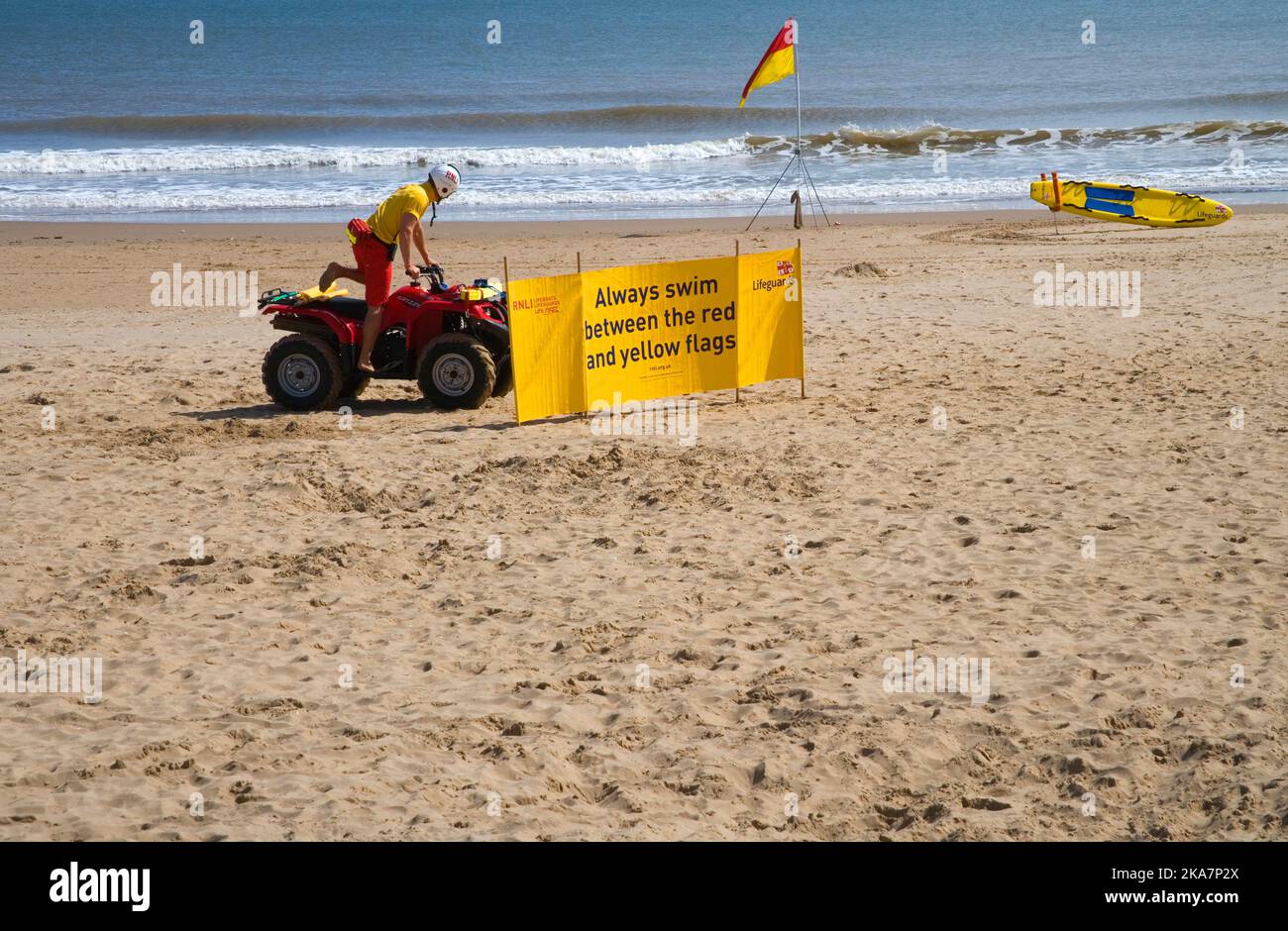 lifeguard on a quad bike on the beach at mablethorpe lincolnshire Stock Photo