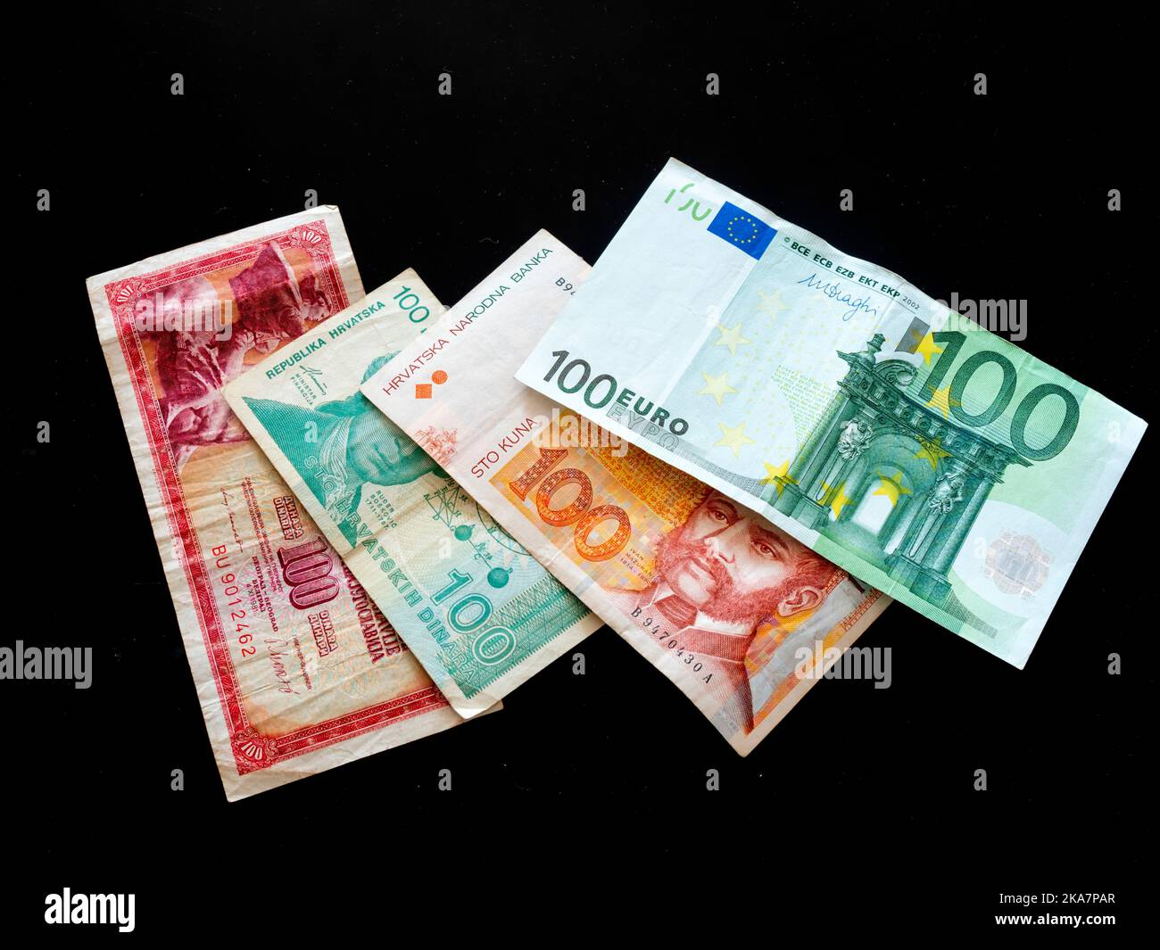 Croat Croatia banknotes of 100 Yugoslav Dinar Dinars Croatian Dinars Kuna Kune Kunas and EU Euro Euros on Black background Stock Photo