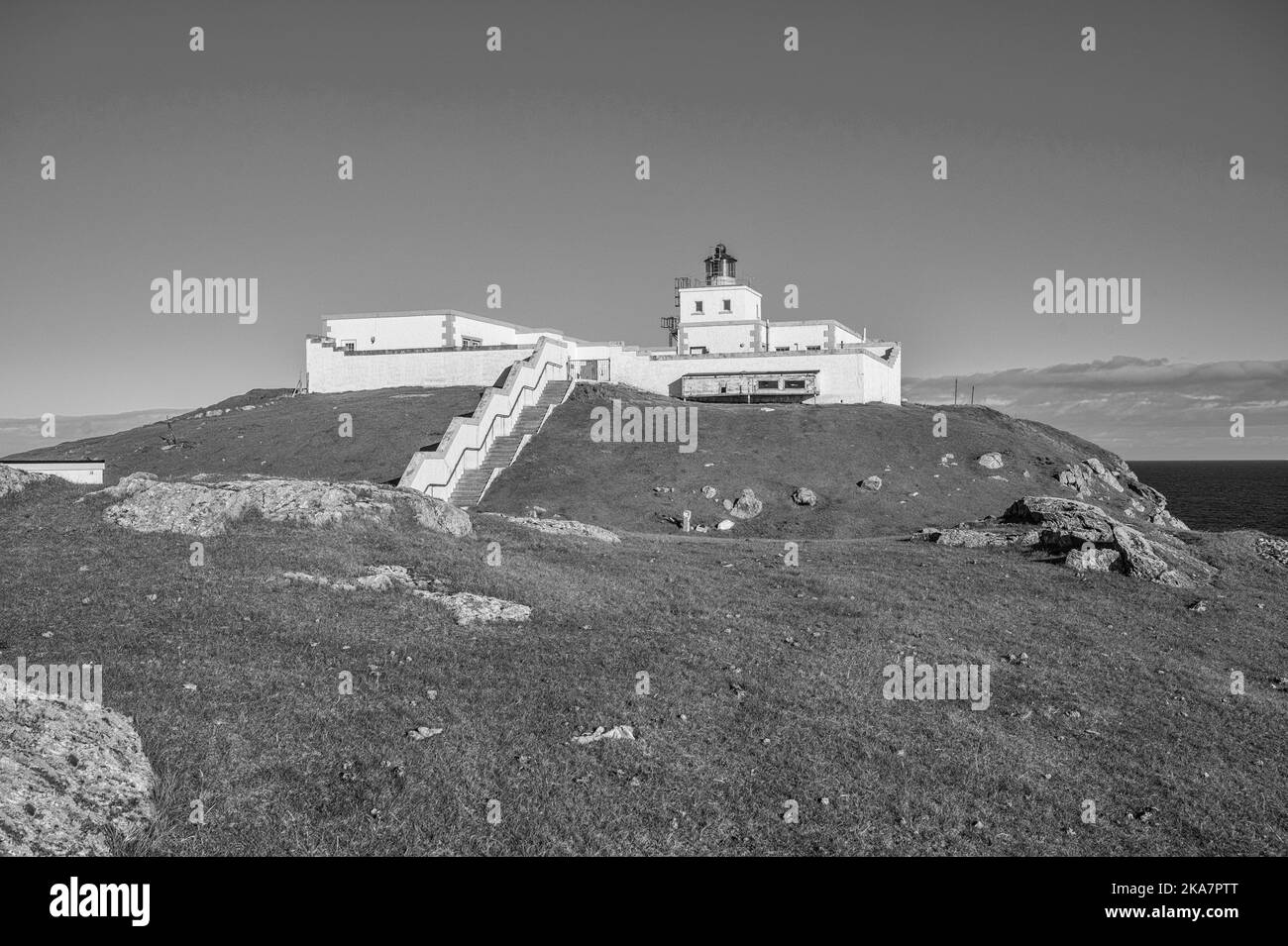 The image is of Strathy Point lighthouse in the far north of the Scottish Highlands overlooking the North Atlantic Stock Photo