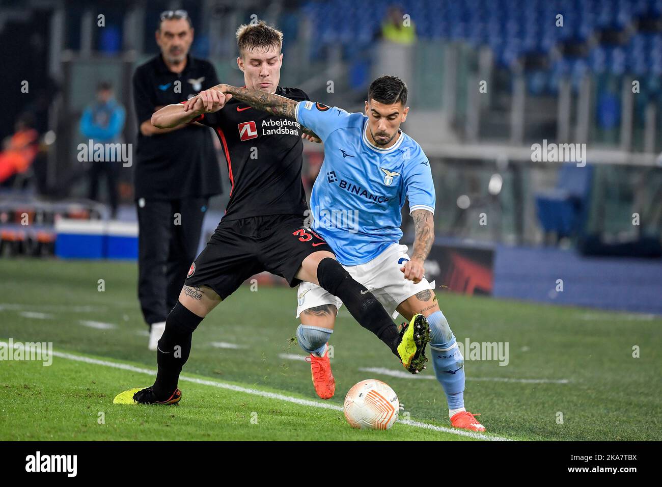 Roma, Italy. 27th Oct, 2022. Charles Rigon Matos of Midtjylland and Mattia Zaccagni of SS Lazio compete for the ball during the Europa League Group F football match between SS Lazio and Midtjylland at Olimpico stadium in Roma (Italy), October 27th, 2022. Photo Andrea Staccioli/Insidefoto Credit: Insidefoto di andrea staccioli/Alamy Live News Stock Photo