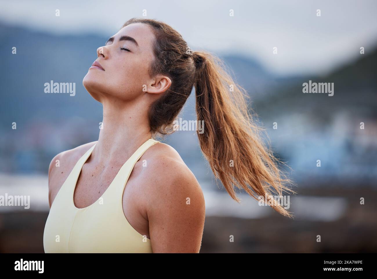 Woman meditation, breathing and spiritual wellness and freedom after city workout. Calm breathe of fresh air, natural outdoor free, faith and relax Stock Photo