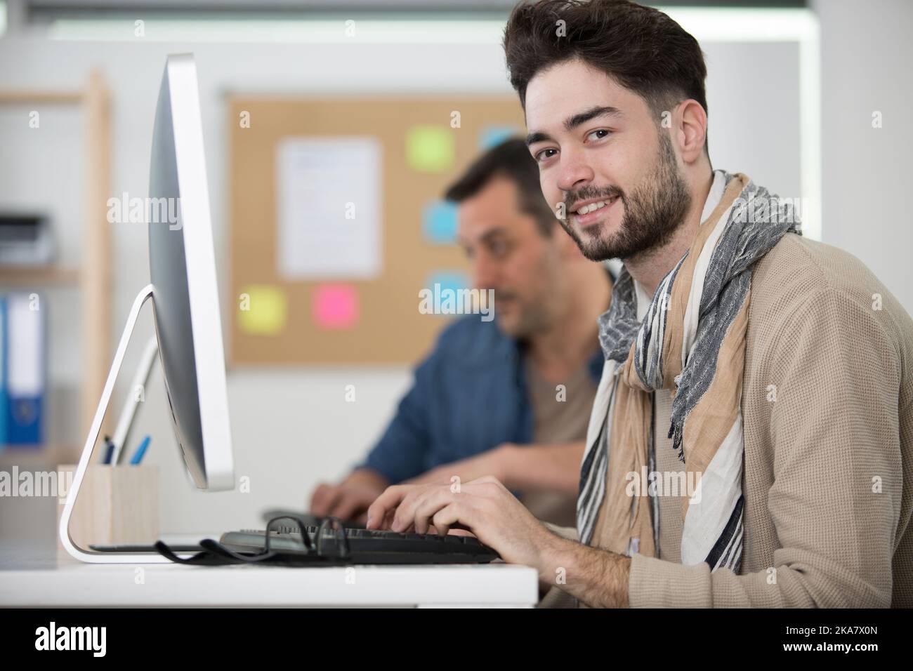 teacher and student working on computer Stock Photo - Alamy