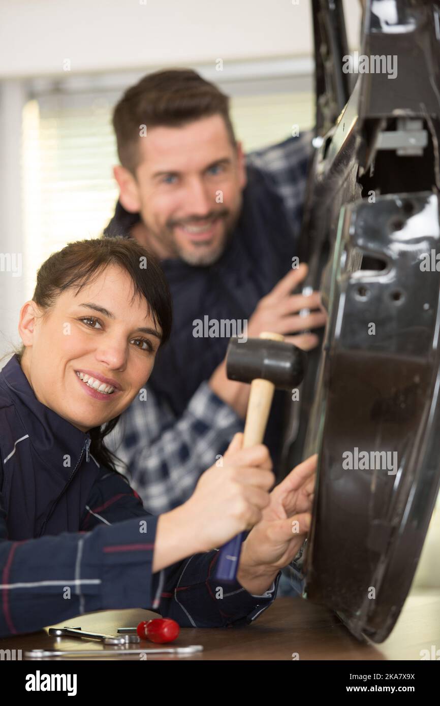 young student in bodywork with teacher Stock Photo Alamy