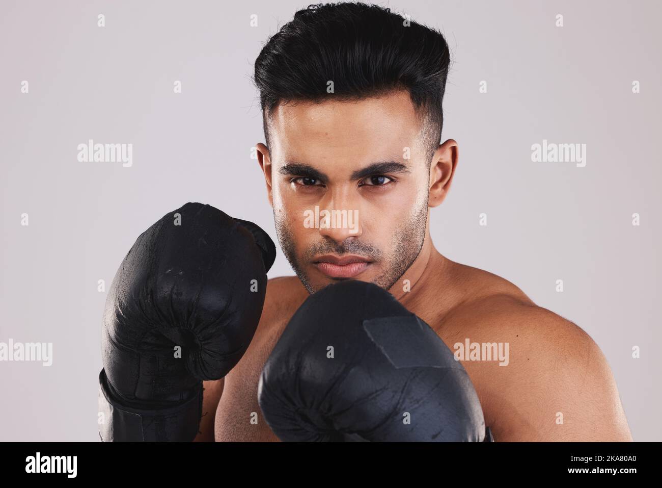 Sports, boxing and portrait of man with boxing gloves isolated on white