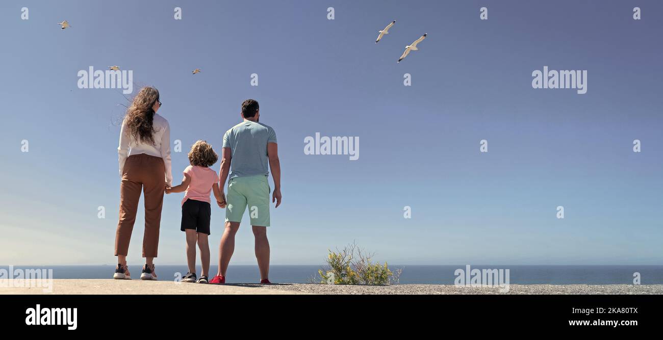 Banner of family embracing on sea beach. Summer family vacation, horizontal banner. Holiday 