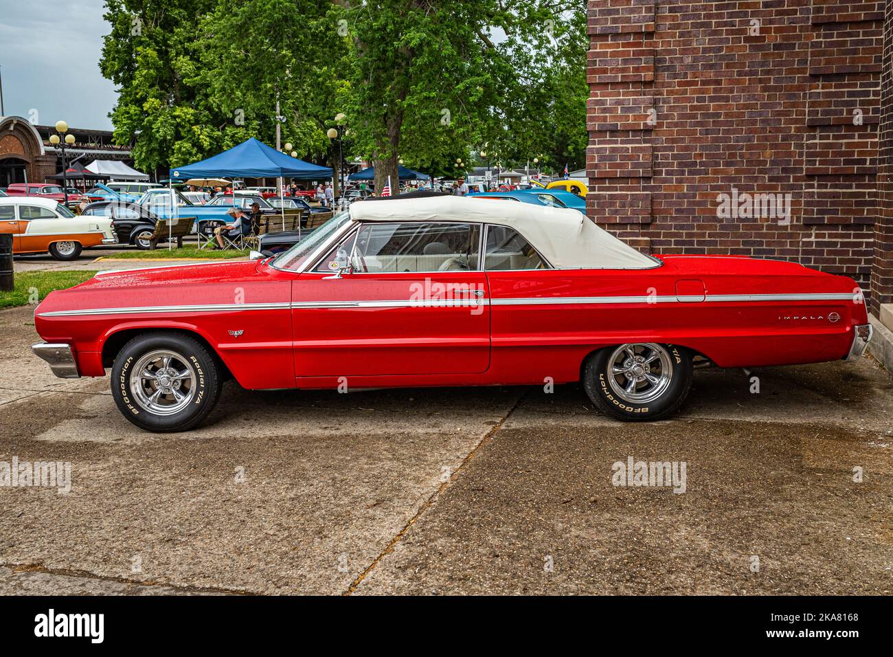 Des Moines, IA - July 01, 2022: High perspective side view of a 1964 Chevrolet Impala SS Convertible at a local car show. Stock Photo