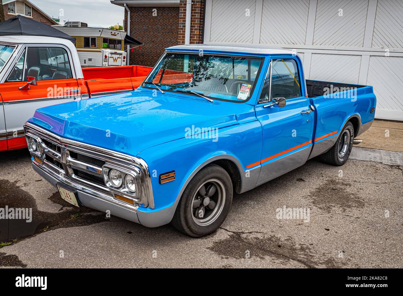 Des Moines, IA - July 01, 2022: High perspective front corner view of a 1972 GMC C10 Pickup Truck at a local car show. Stock Photo