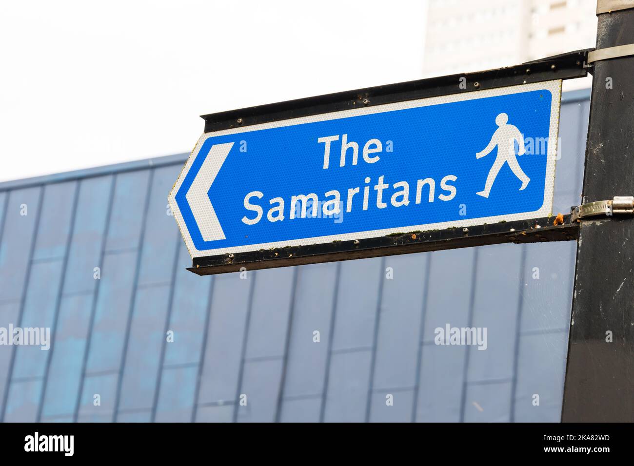 Sign showing pedestrian route to the nearest Samaritans help. Birmingham, Warwickshire, West midlands Stock Photo