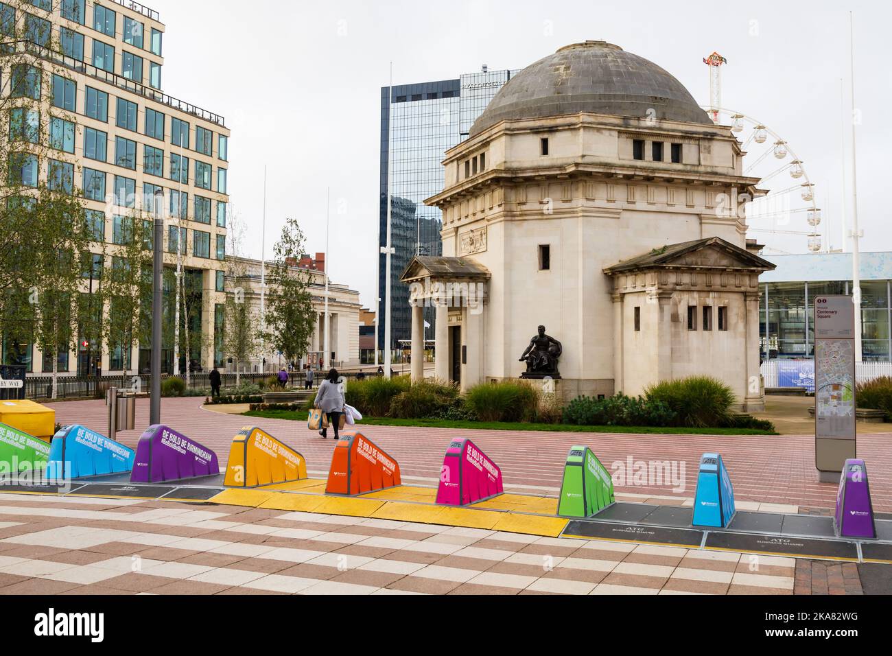 rainbow coloured anti terrorist vehicle ramps with the Hall of Memory memorial to WW1 First world War soldiers, sailors and airmen. Centenary Square, Stock Photo