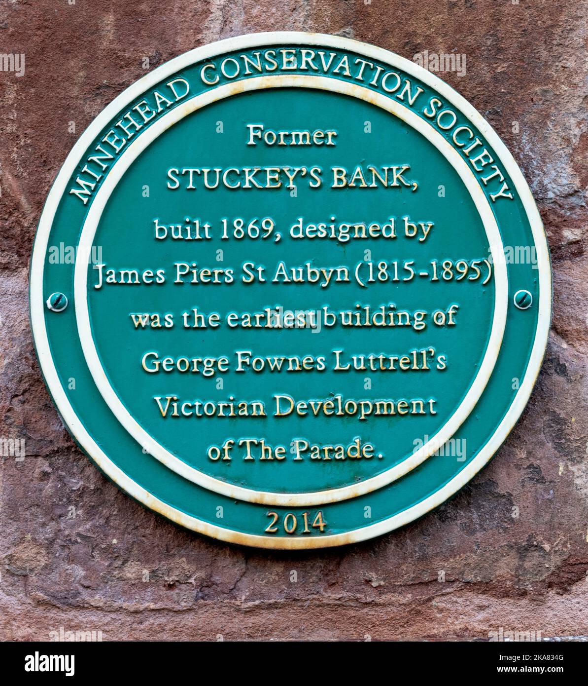 Green heritage plaque of Minehead Conservation Society at the former Stuckey's Bank, The Parade, Minehead, Somerset, England, UK Stock Photo