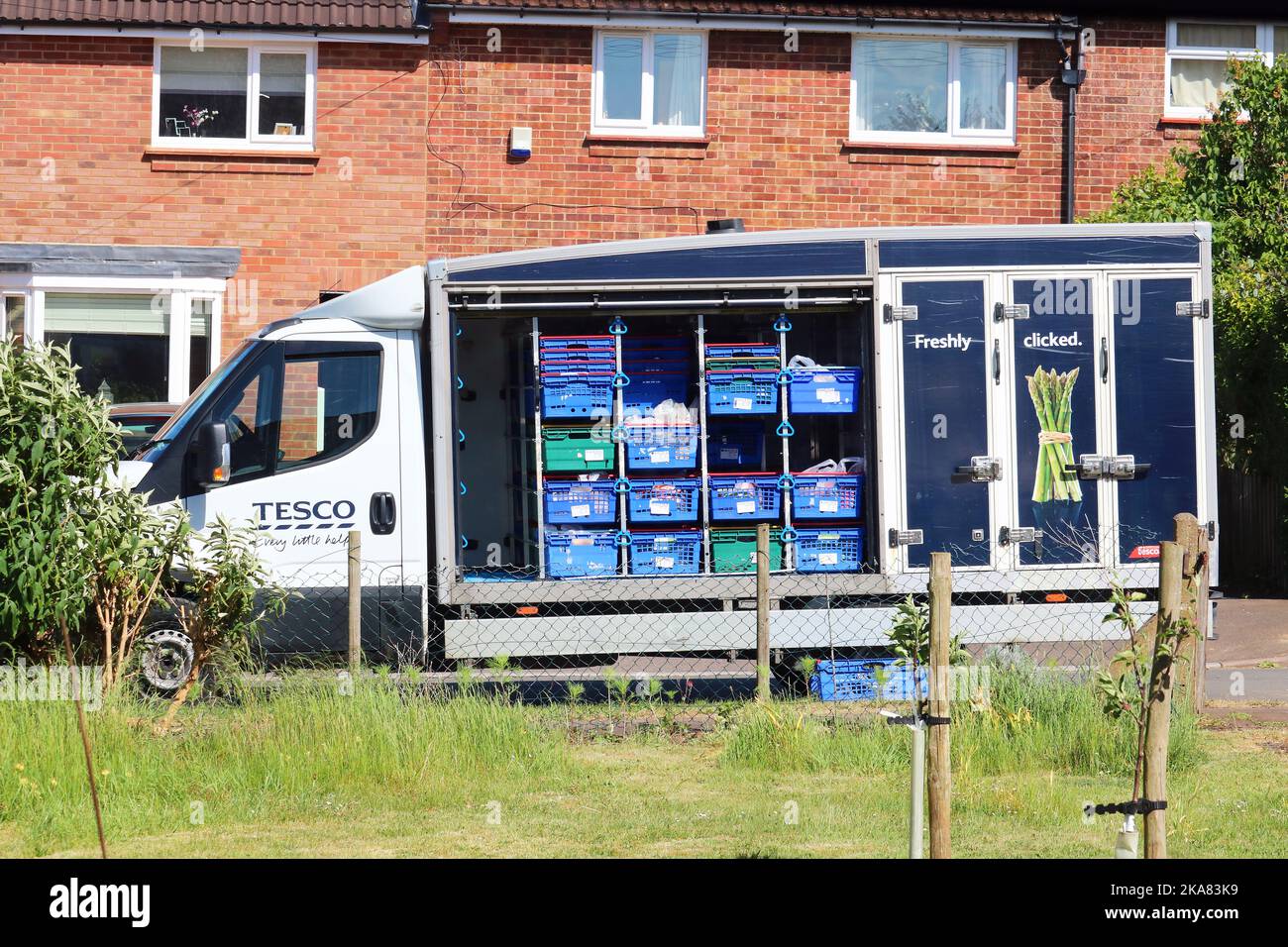 Tesco home delivery van parked. Making online deliveries to private houses. Stock Photo