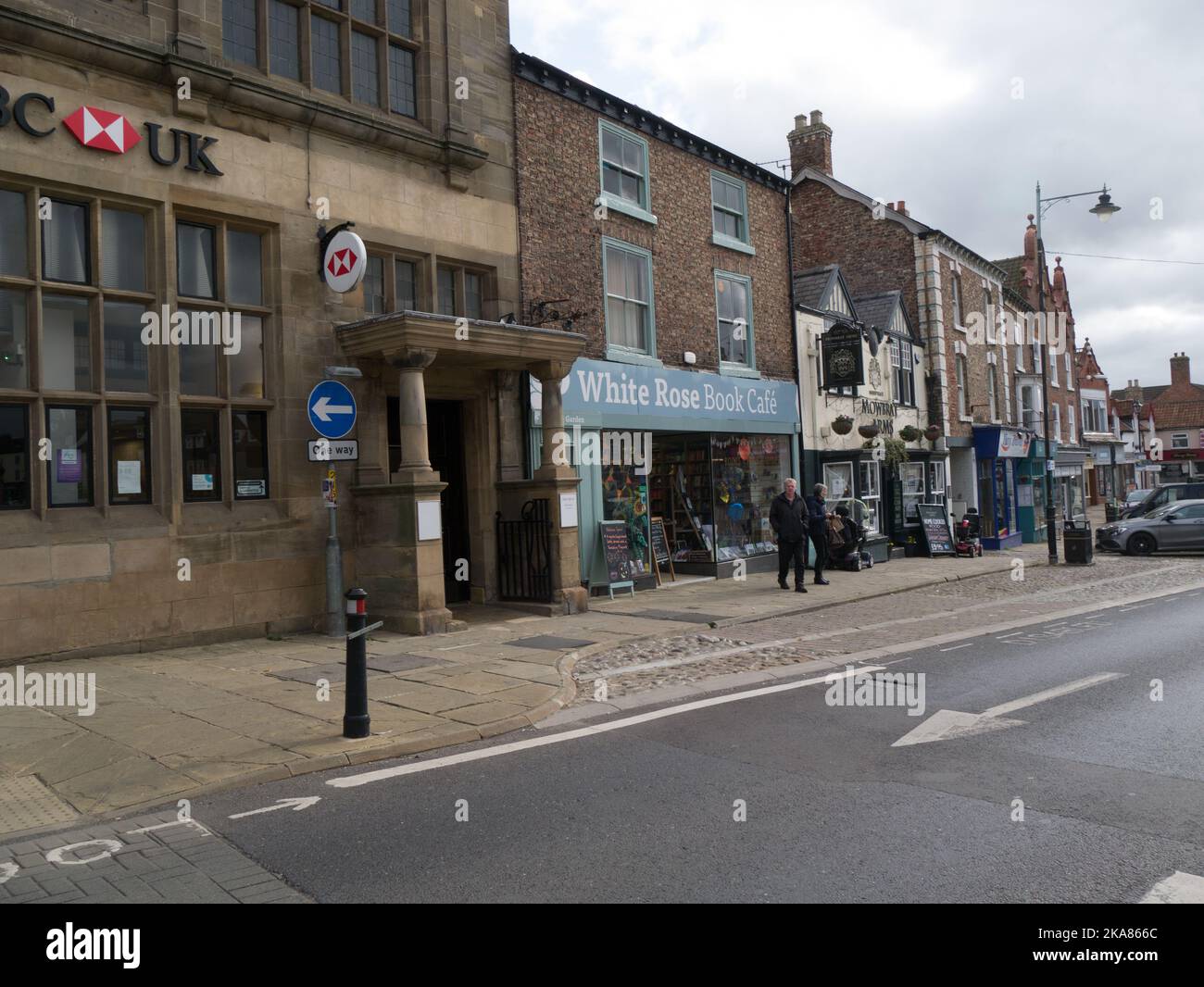 View of HSBC Bank White Rose Book cafe Mowbray Arms pub and shops