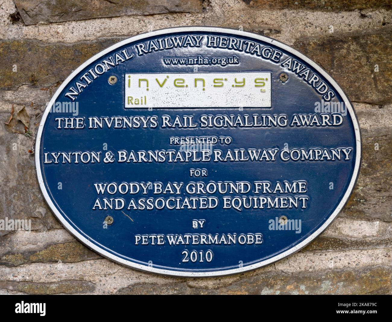 Heritage blue plaque awarded by National Railway Heritage Awards to Lynton & Barnstaple Railway Company at Woody Bay Railway Station, Devon, UK Stock Photo