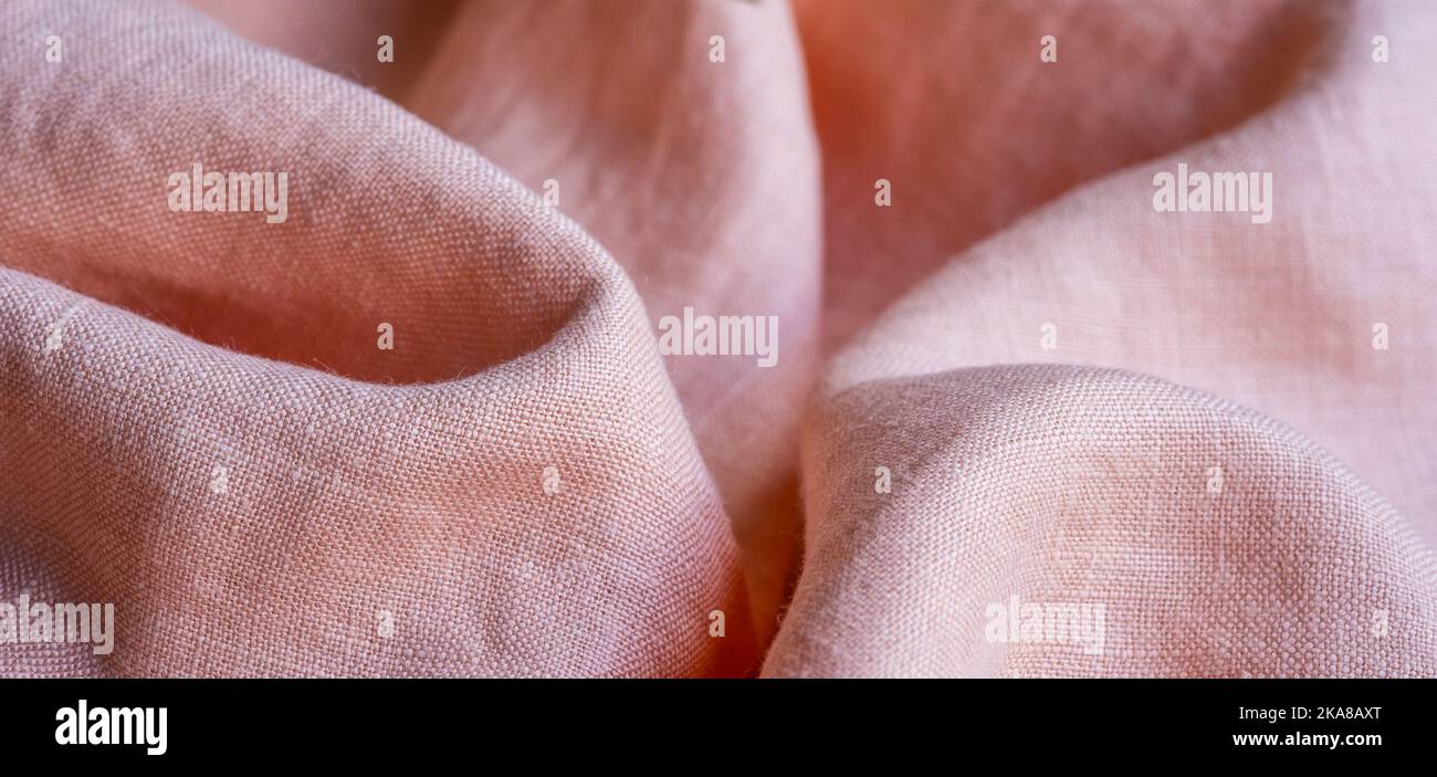 Wrinkled linen cloth folded napkins. Linen fabric texture. Concept of