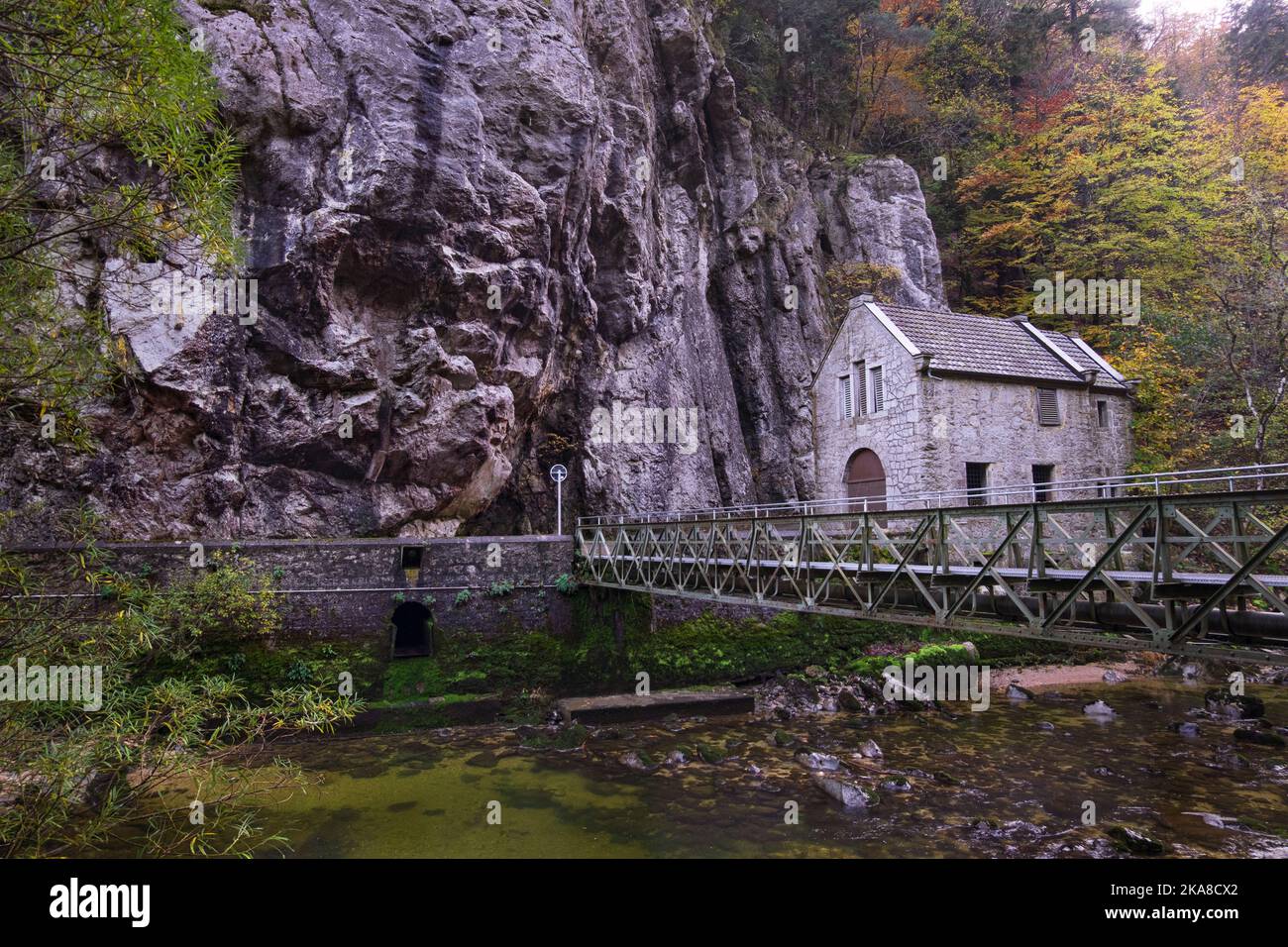 Gorges de l'Areuse, Boudry, Neuchatel, Switzerland, Europe. Beautiful romantic autumn landscape with bridge and architecture. River in the Jura Mounta Stock Photo
