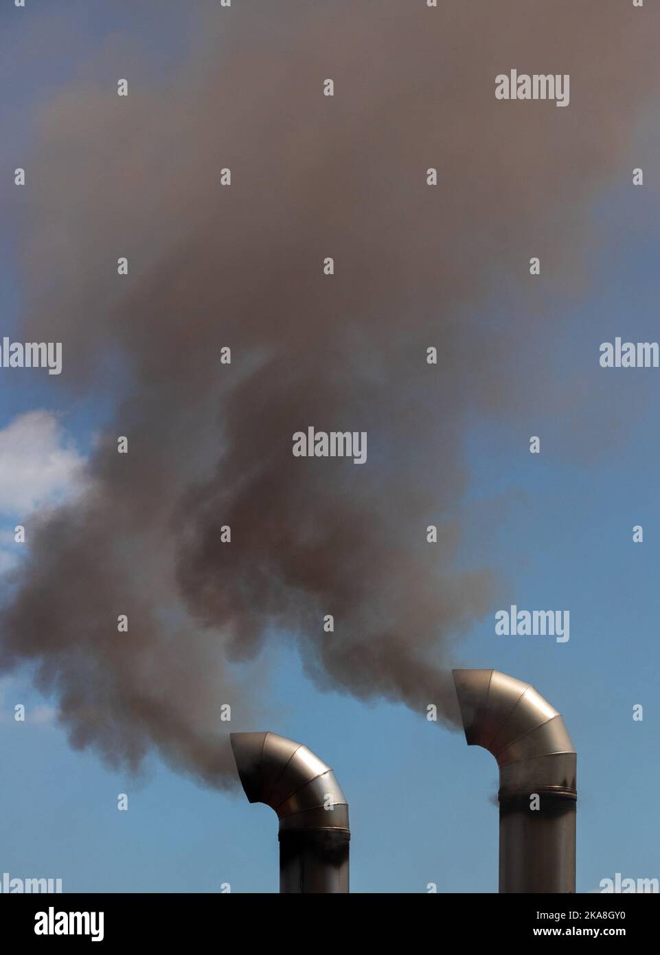Black smoke from two truck exhausts, pollution, toxic, car Stock Photo