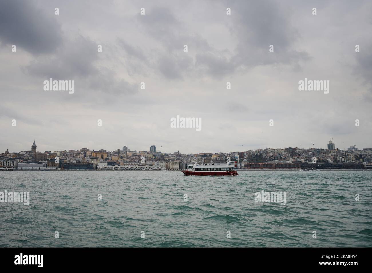 Boat tour in Bosphorus water on Istanbul city background Stock Photo