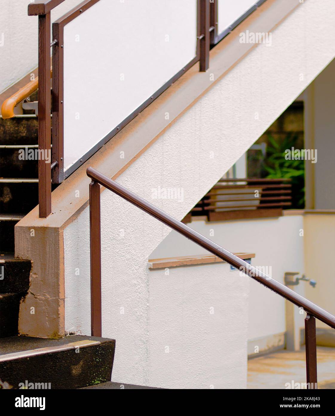 An indoor marble staircase with stainless steel handrail Stock Photo ...