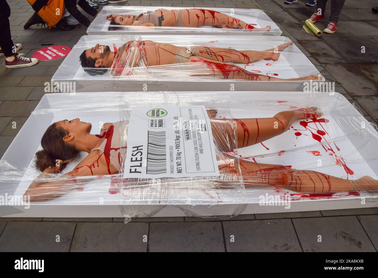 London, England, UK. 1st Nov, 2022. PETA activists packaged as 'Free-range human meat'' staged an action outside Whole Foods store next to Piccadilly Circus on World Vegan Day to highlight the fact that ''humane'' labels on meat are meaningless, to remind people of the horrors of the meat industry, and to promote veganism. (Credit Image: © Vuk Valcic/ZUMA Press Wire) Stock Photo