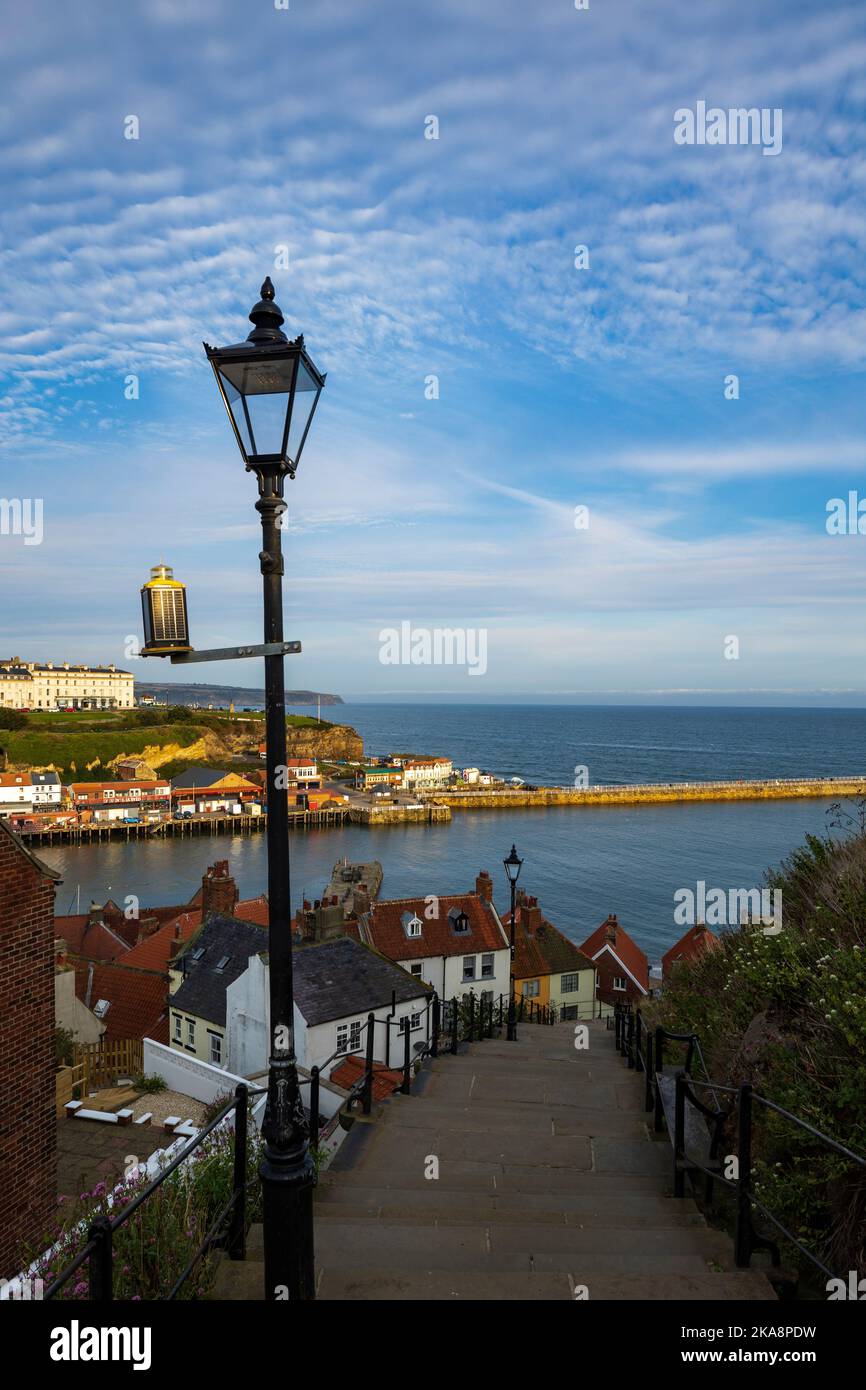 Looking down The 199 Steps to the Harbour Whitby North Yorkshire England in the morning light Stock Photo