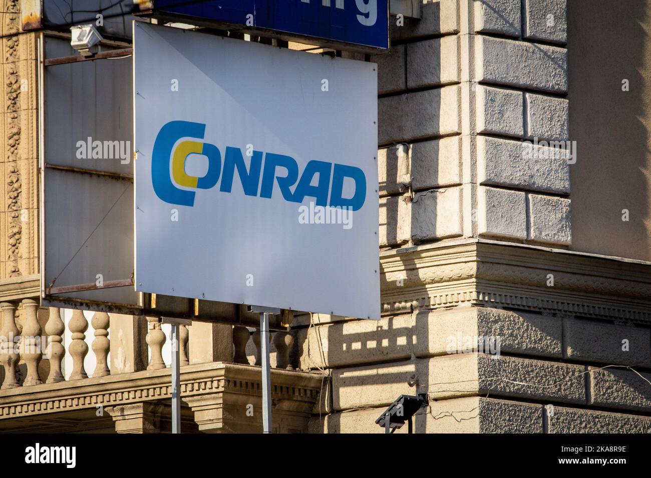 Picture of a sign with the logo of Conrad on their main store for Budapest, Hungary. Conrad Electronic SE is a German retailer of electronic products Stock Photo