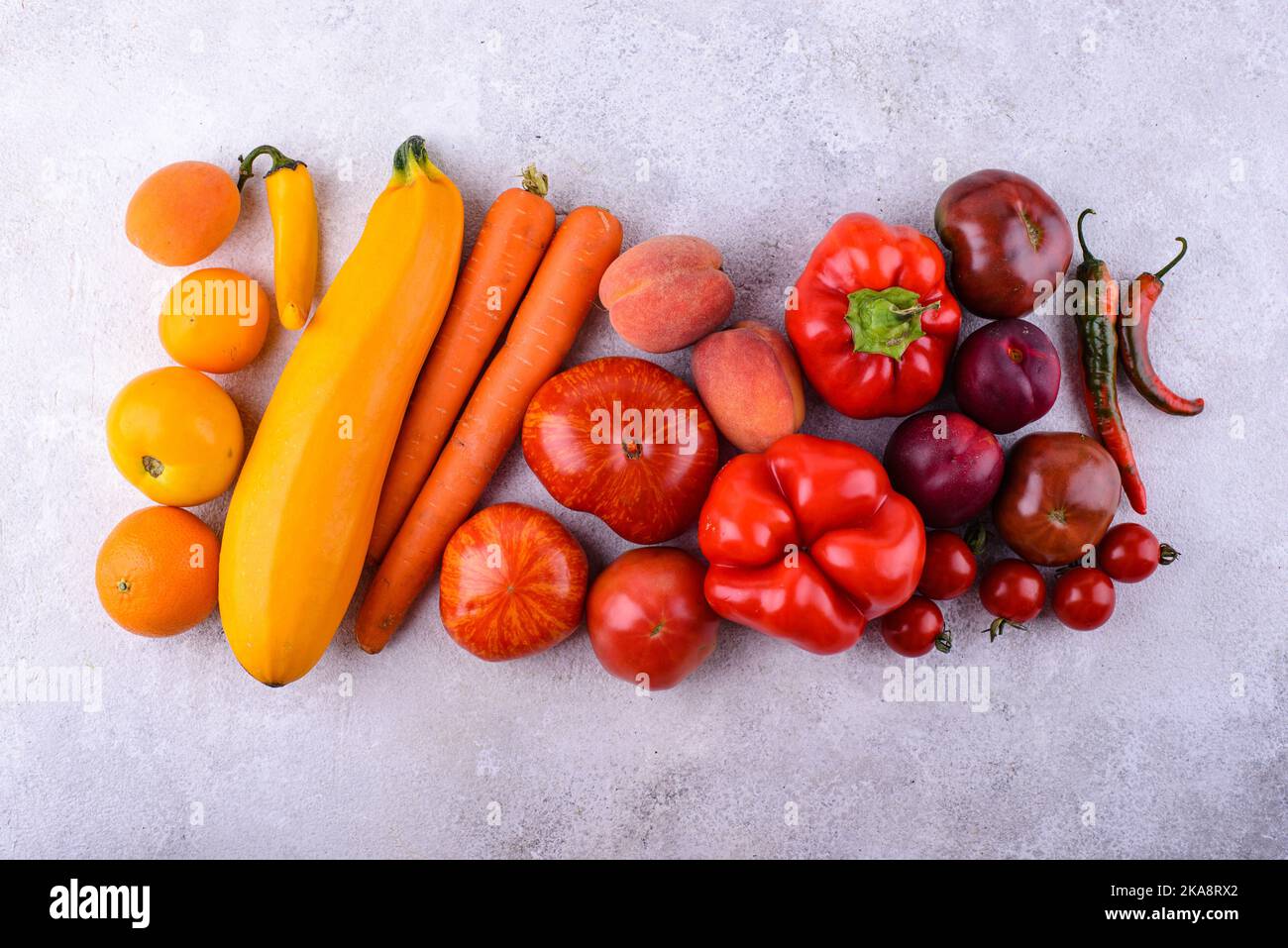 Yellow and red vegetables and fruits Stock Photo Alamy