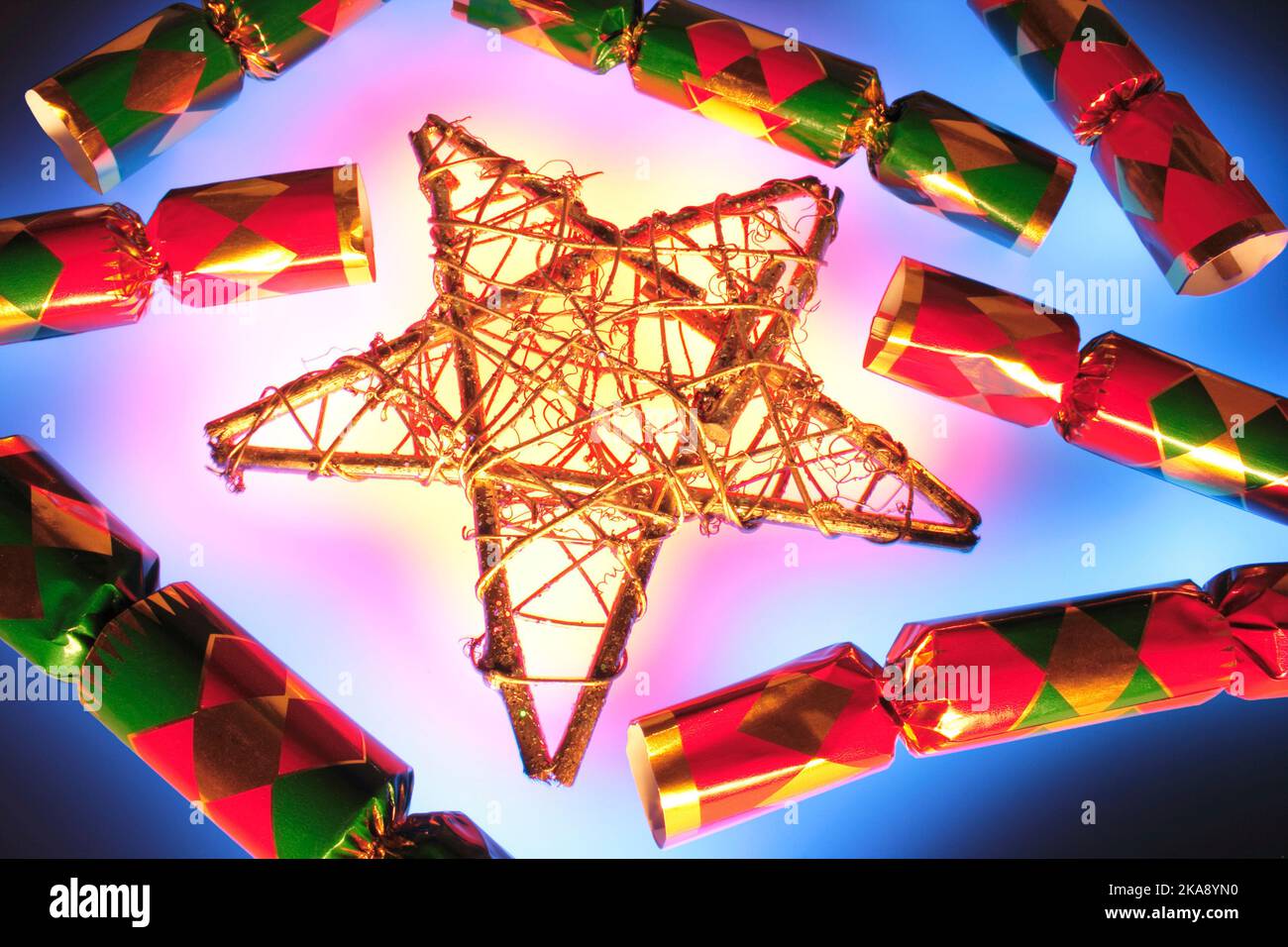 Christmas Crackers and Star Ornament Stock Photo Alamy