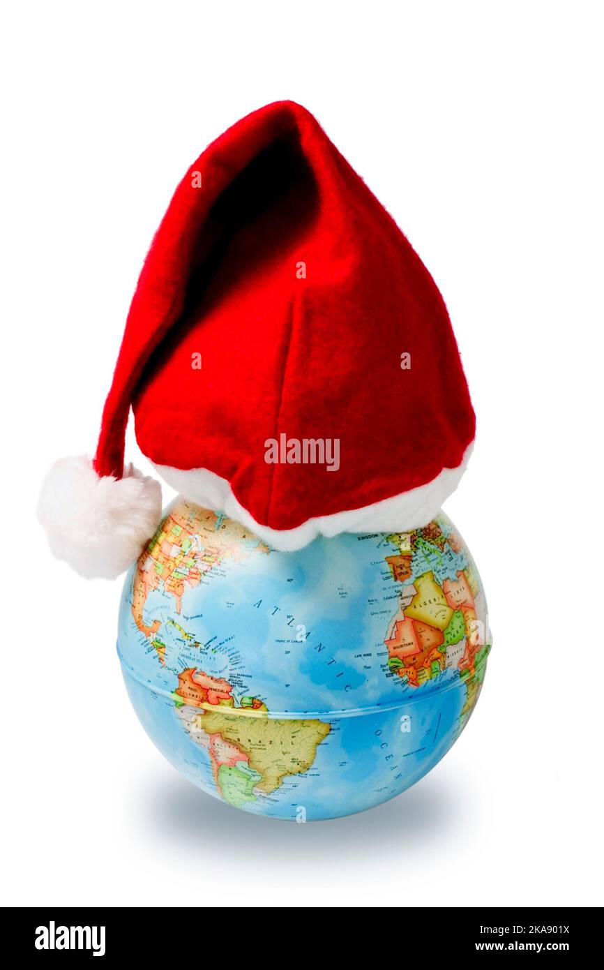 Santa's Hat on Globe Stock Photo