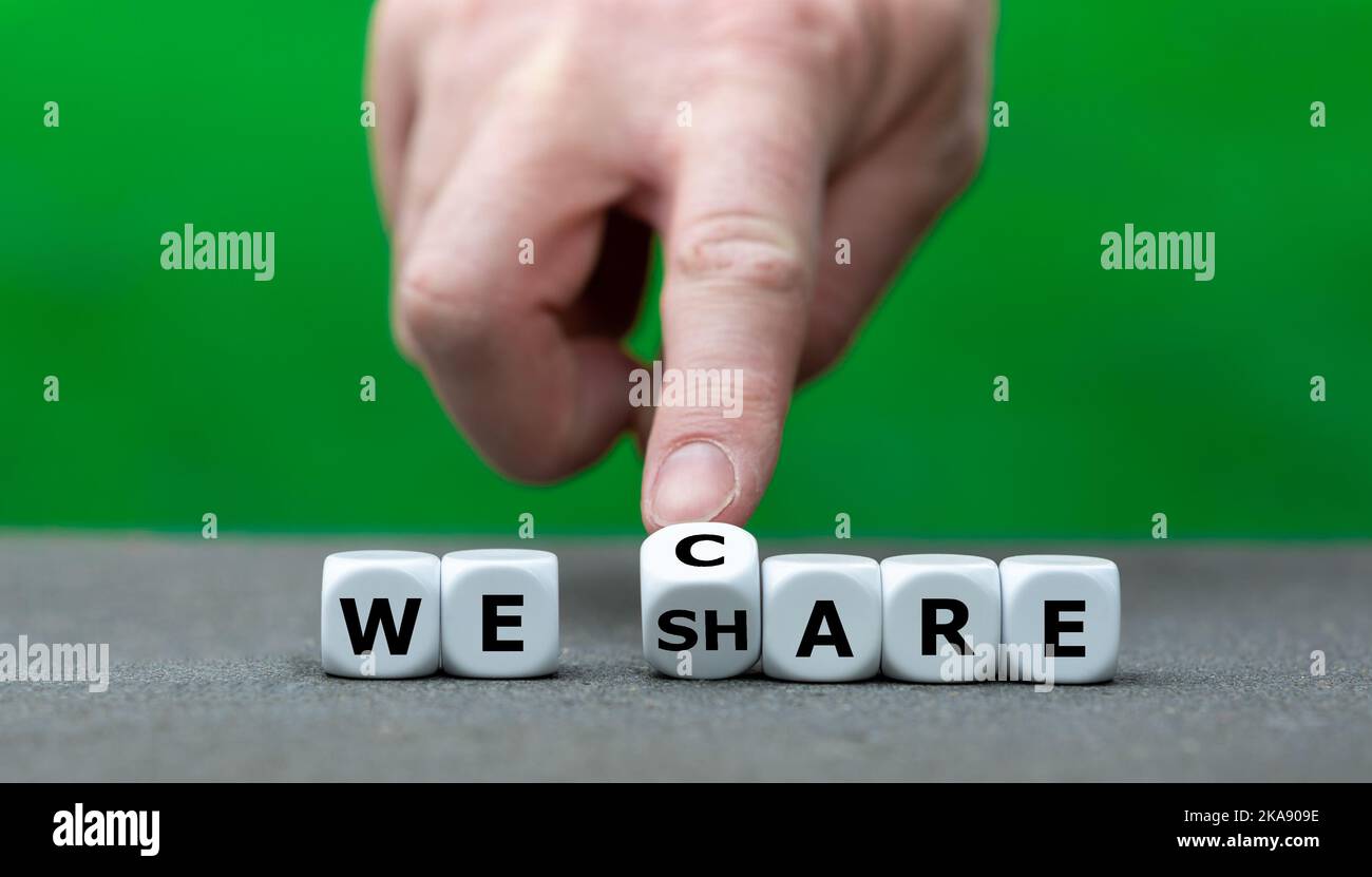 Dice form the expressions 'we care' and 'we share'. Stock Photo