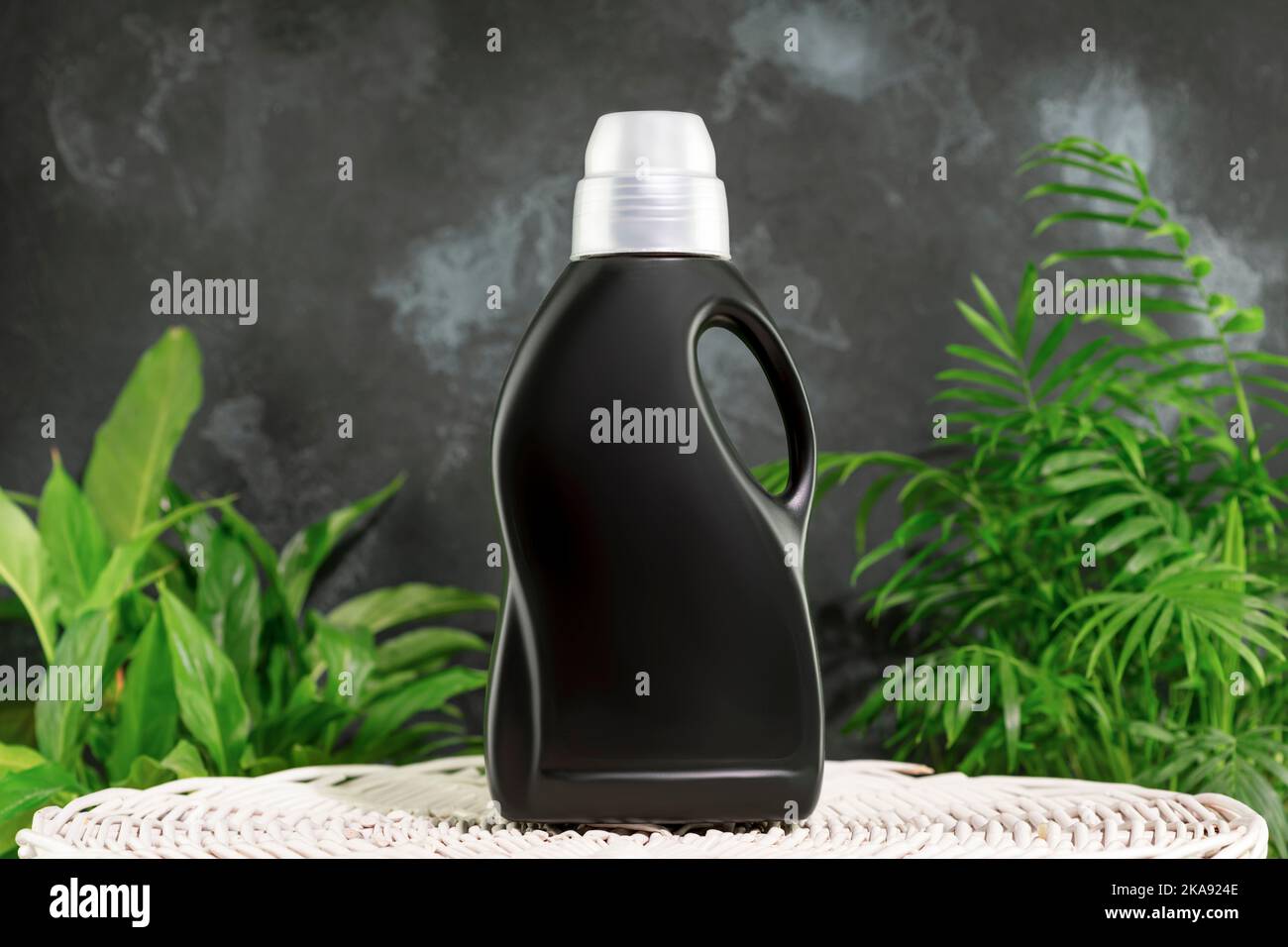 Natural laundry detergent mockup for washing black clothes. Washing