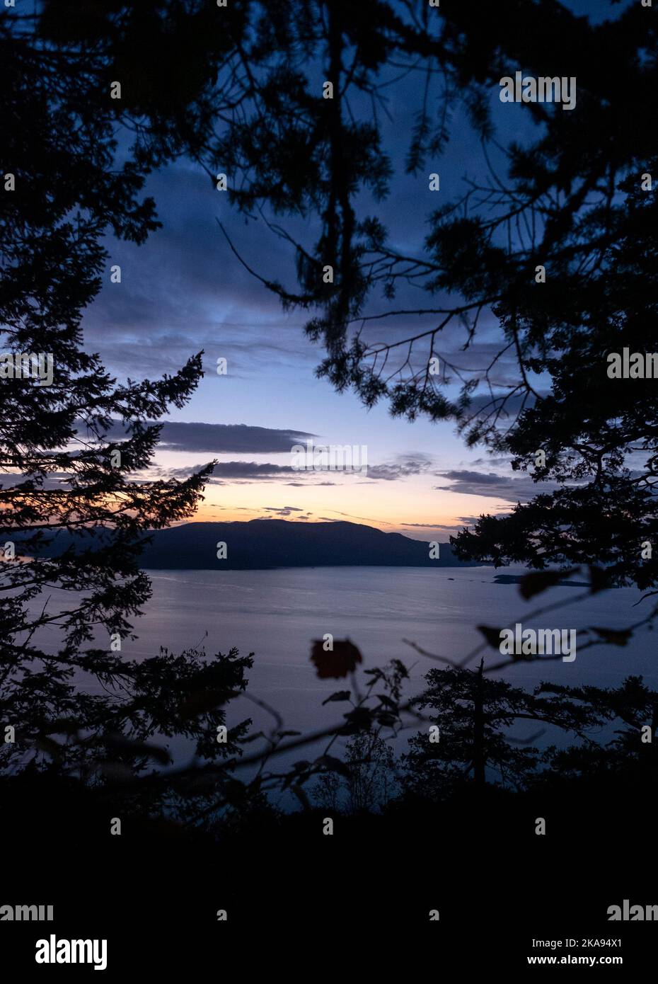 View of the Rosario Strait; overlook at Baker Preserve, Lummi Island, Washington, USA; San Juan Islands; Orcas Island in the distance Stock Photo