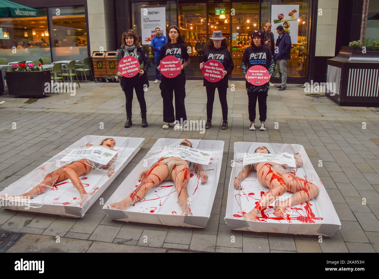 London, UK. 01st Nov, 2022. PETA (People for the Ethical Treatment of Animals) activists seen packaged as “Free-range human meat” during a protest outside Whole Foods store next to Piccadilly Circus on World Vegan Day to highlight the fact that "humane" labels on meat are meaningless, to remind people of the horrors of the meat industry, and to promote veganism. Credit: SOPA Images Limited/Alamy Live News Stock Photo
