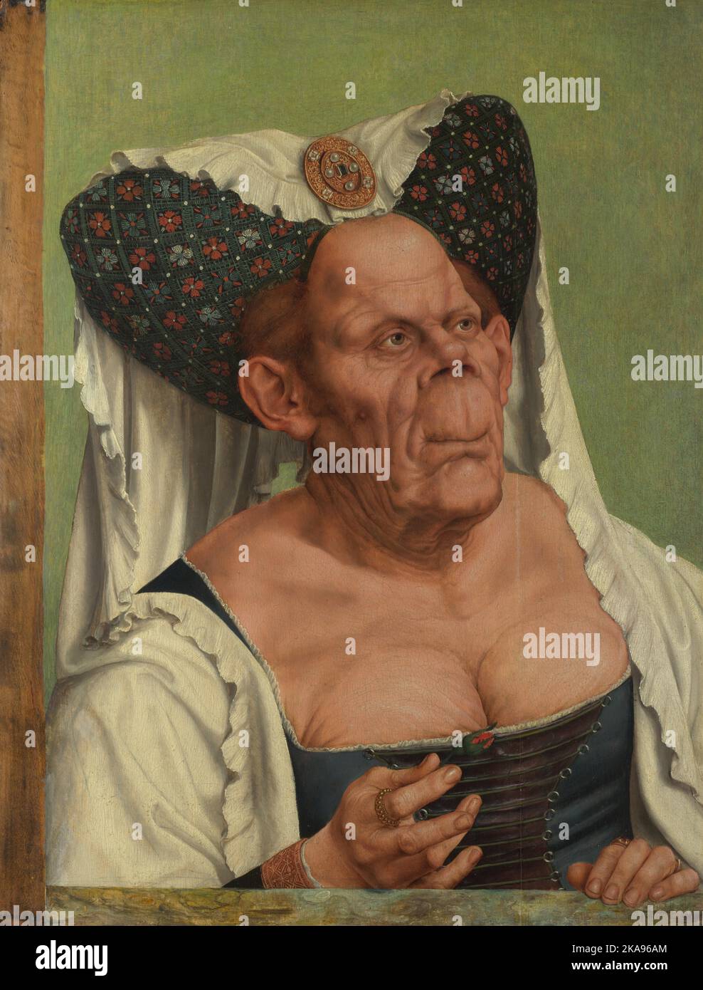Quentin Massys. A Grotesque Old Woman. “An Old Woman (‘The Ugly Duchess’) ', c.1513. Oil on oak, 64.2 × 45.5 cm. Stock Photo
