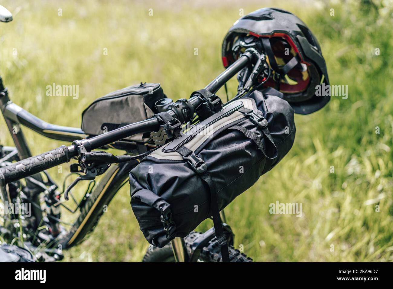 Bikepacking equipment on a mountain bike. Mountain bike with packed travel gear, bike packing