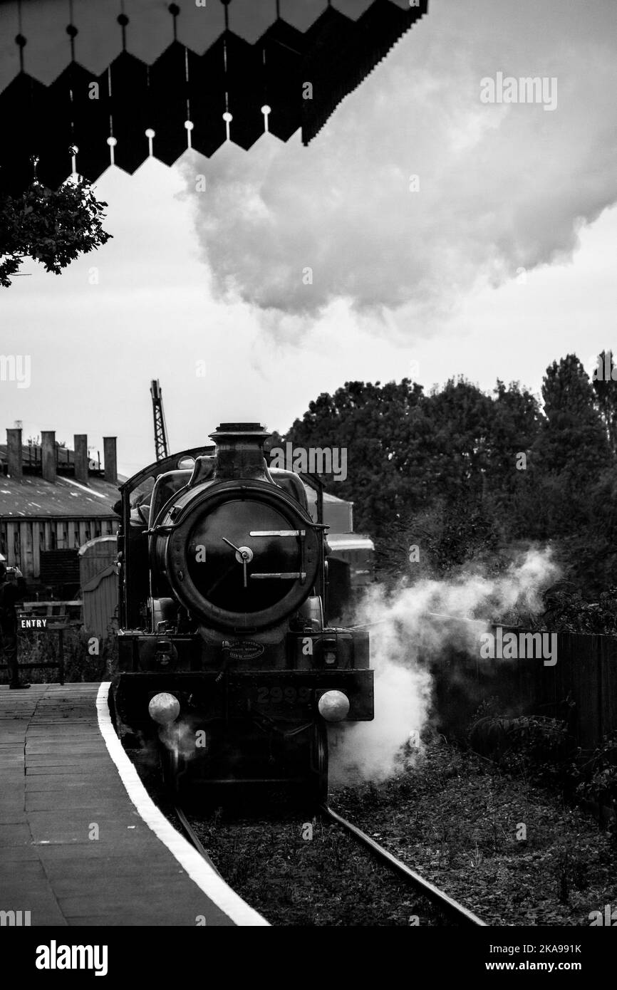 Black and white of steam railway arrival station Stock Photo