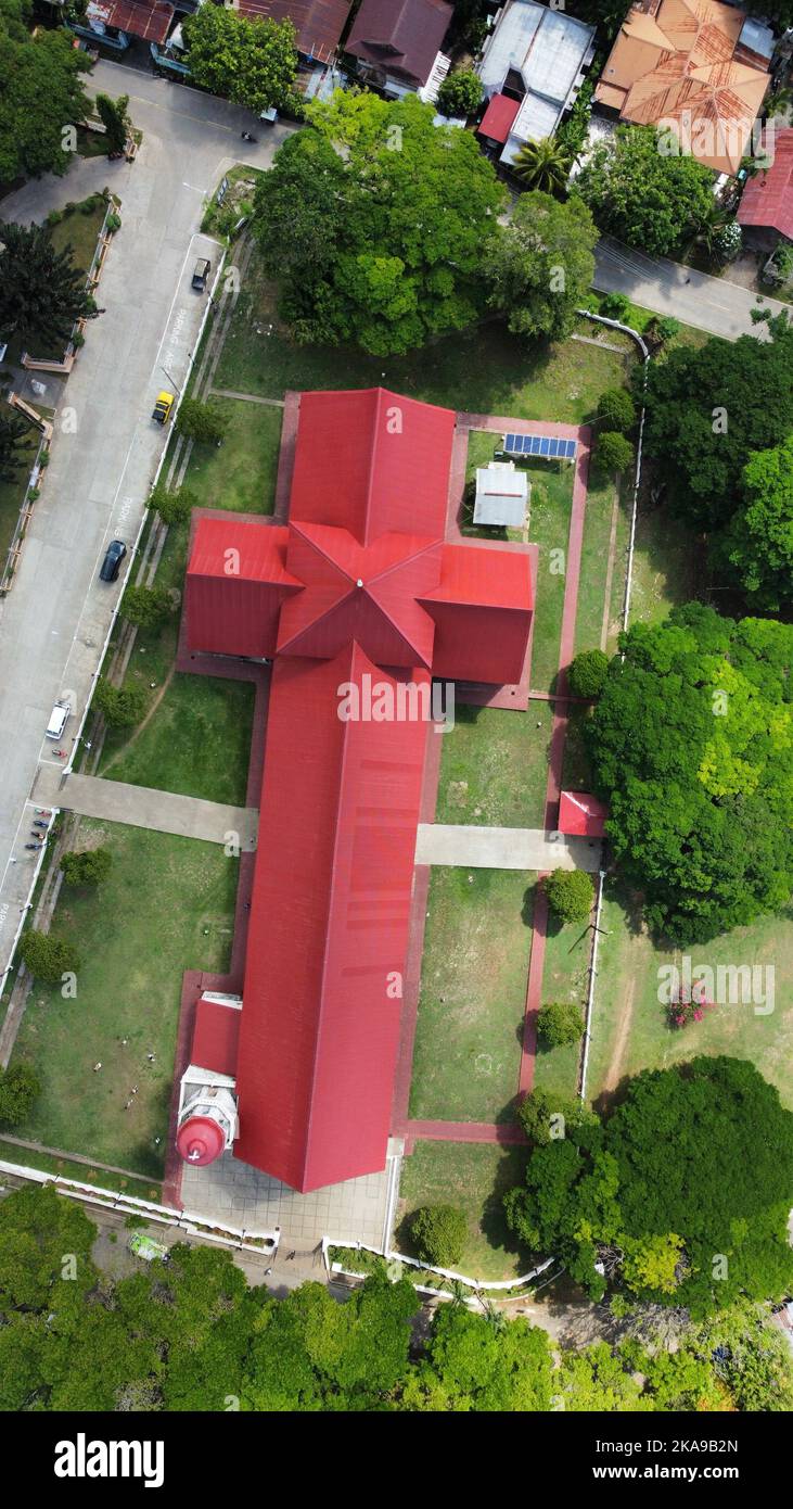 A vertical aerial shot of the old Spanish St Isidore Church in the Island of Siquijor, the Philippines Stock Photo