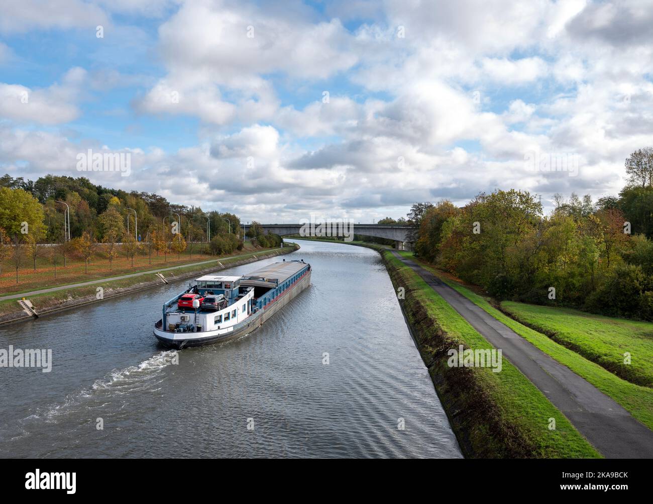barge in canal between brussels and charleroi on sunny day in autumn Stock Photo
