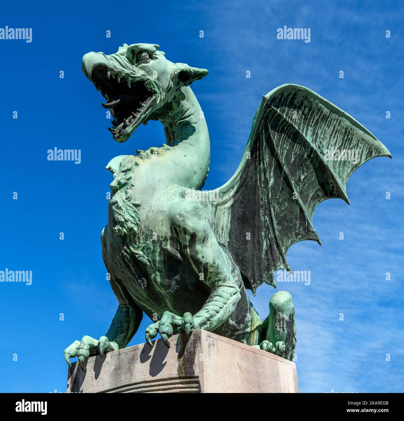 Dragon statue on the Dragon Bridge (Zmajski most) in the old town, Ljubljana, Slovenia Stock Photo