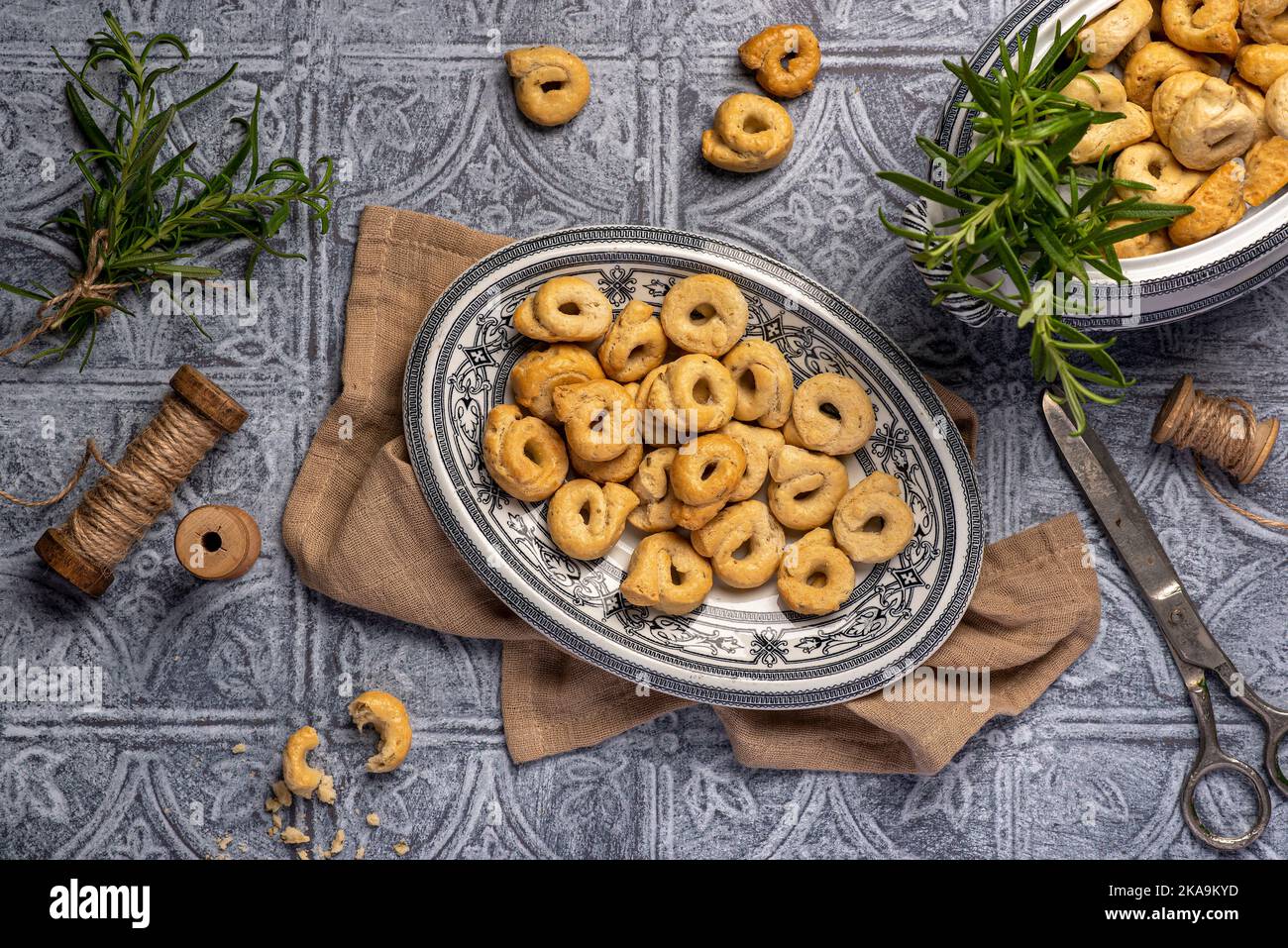 Food photography of taralli with rosemary, salty, bread, crunchy