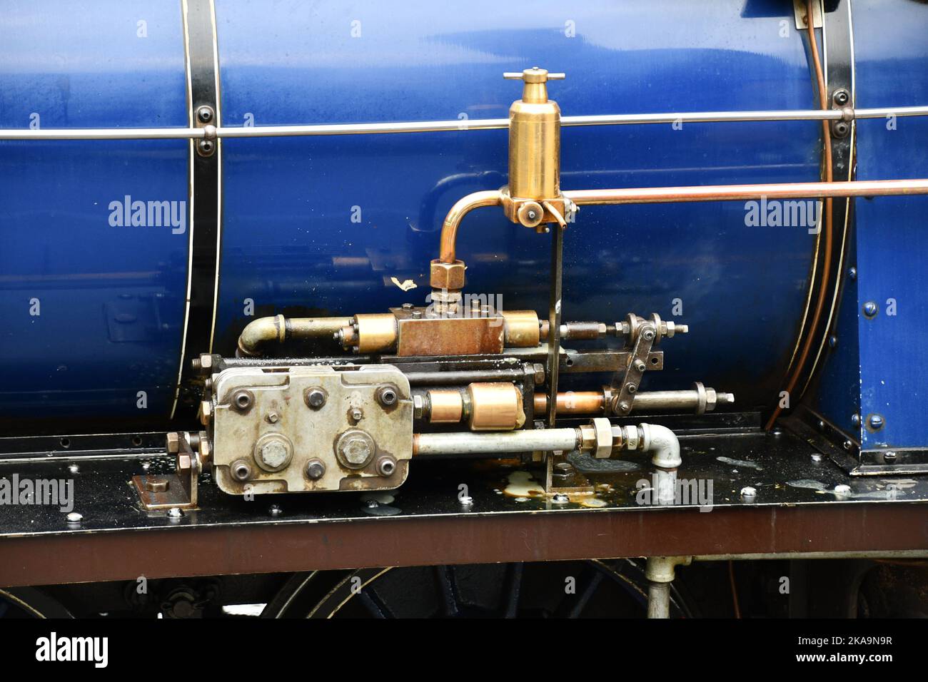 Close up of some of the control pipework on the steam locomotive Whillan Beck which runs on the 7 scenic miles of track from Ravenglass to Dalegarth Stock Photo