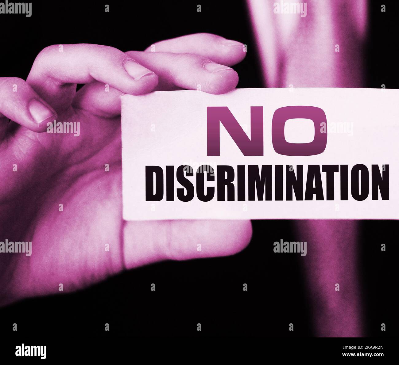 No discrimination words on a card in businessman hand. Social concept ...