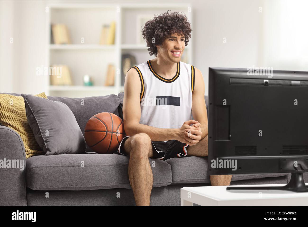Man watching tv sport hi-res stock photography and images