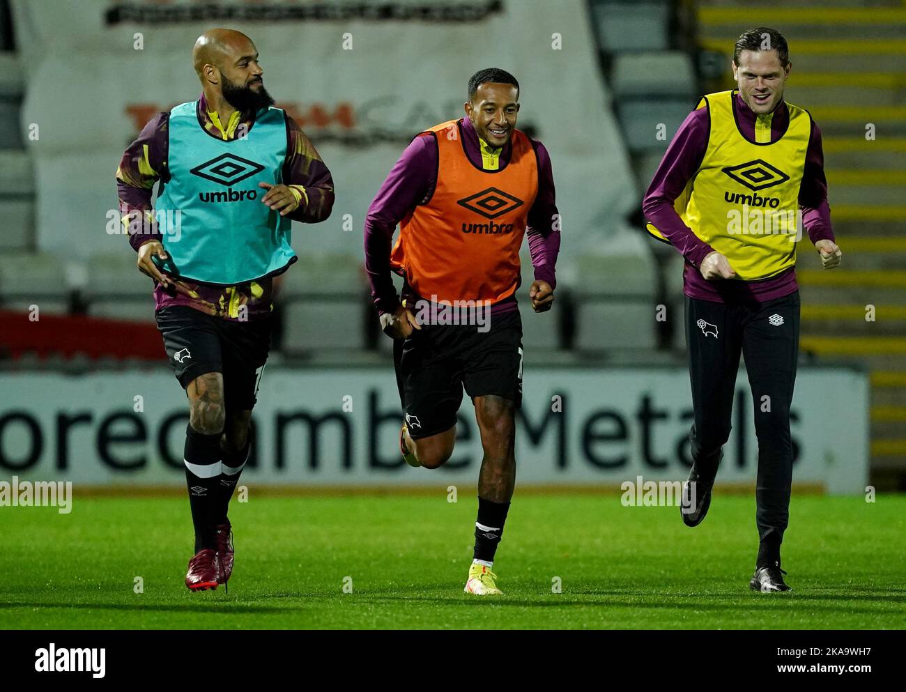 Derby County players warm up ahead of the Sky Bet League One match at the Mazuma Stadium, Morecambe. Picture date: Tuesday November 1, 2022. Stock Photo