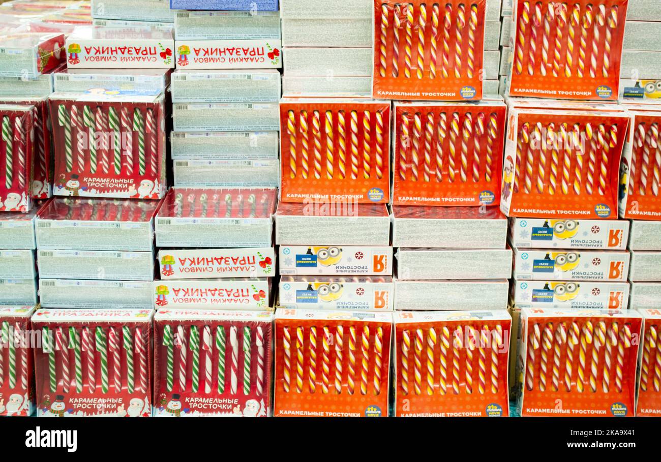 Moscow, Russia, November 2020 Many striped Candy canes in boxes