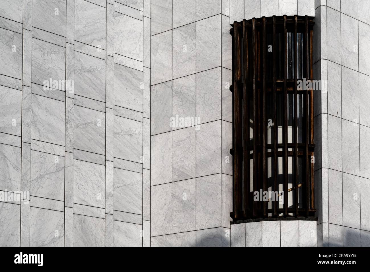 Nykoping, Sweden - 13 June, 2022: Architectural details of exterior marble and teak walls of modernist 1960s public building Nykoping City Hall showin Stock Photo