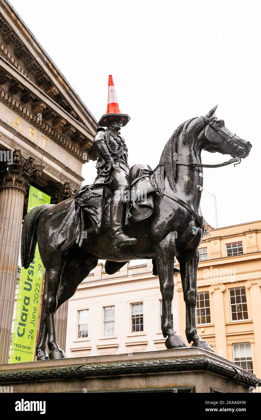Equestrian statue of the Duke of Wellington, famous for having a traffic cone hat. Glasgow